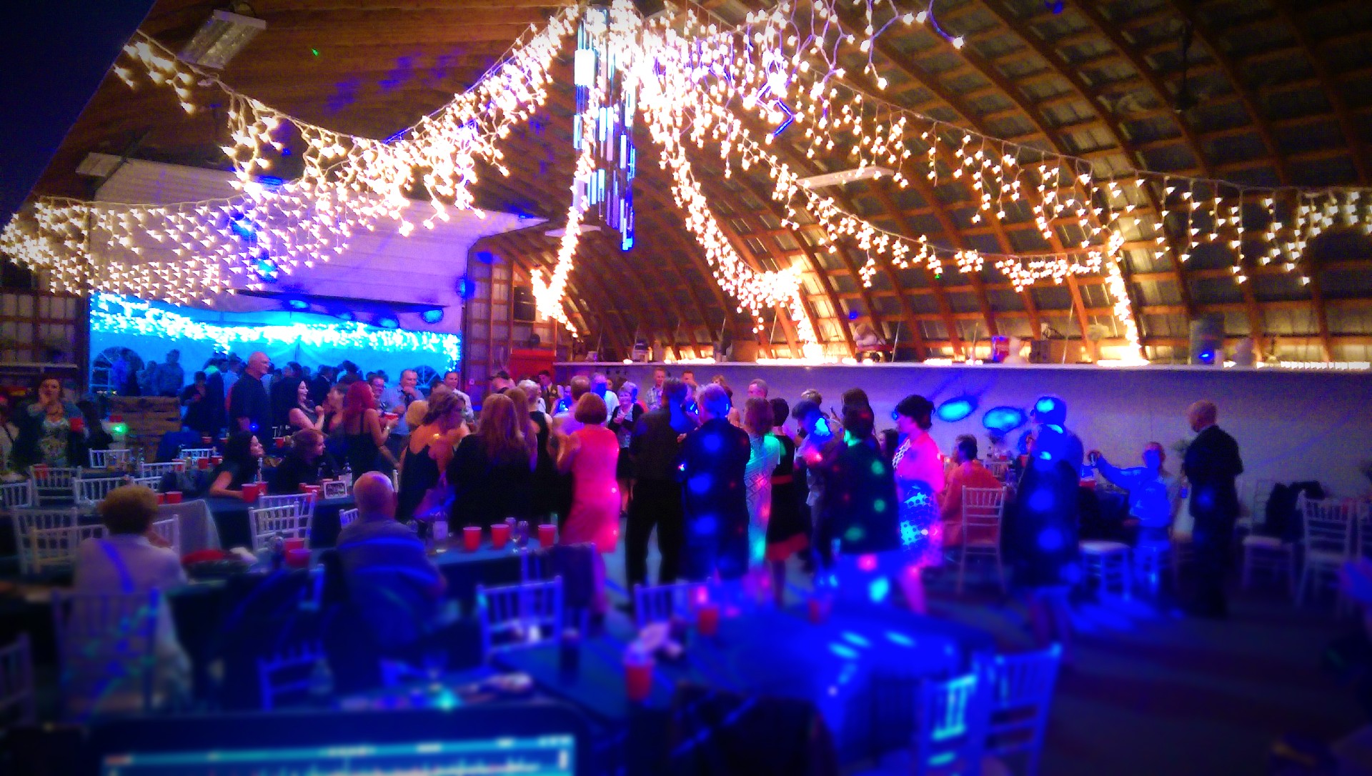Kinetic Beats DJ lighting a wedding party dancing